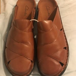 Brown Clarks slides new in box. Size 9